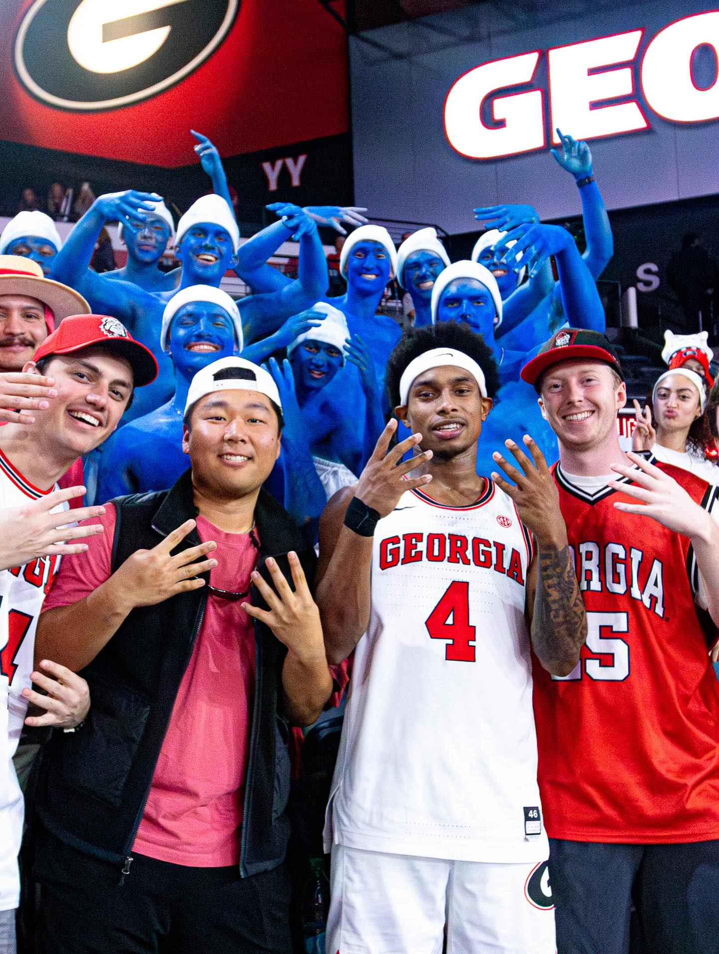 Smurf with Georgia's student section painted blue as Smurfs